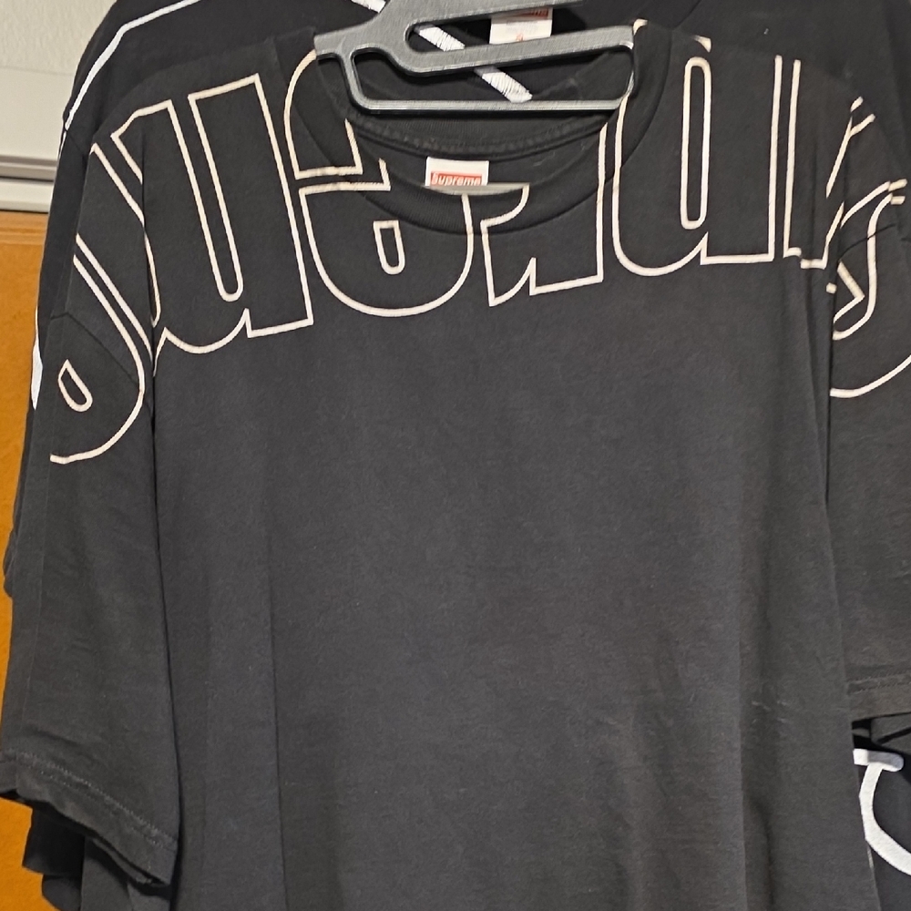 Supreme Black Tee with Bold Lettering